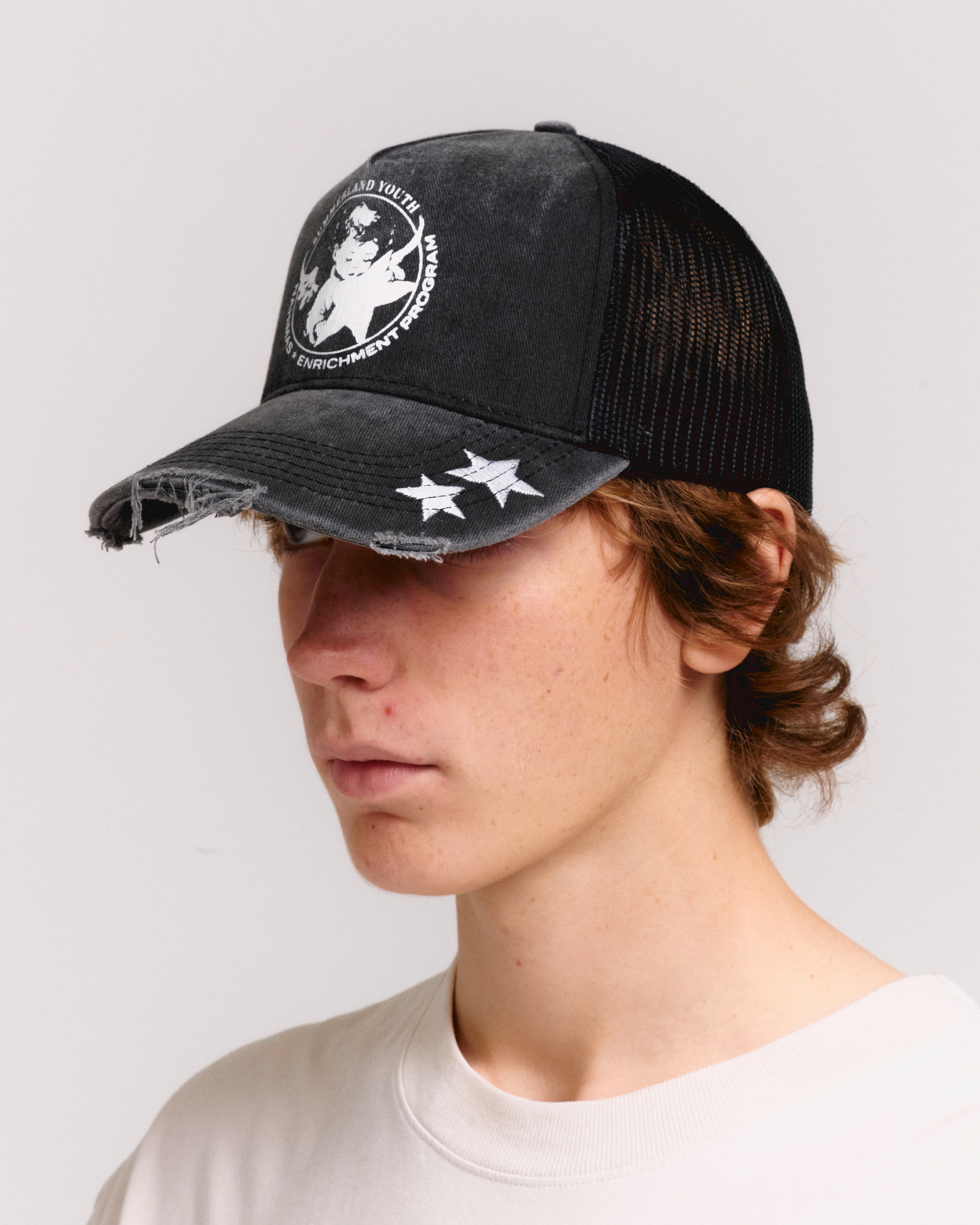 YOUTH ENRICHMENT WASHED TRUCKER HAT - Image 3