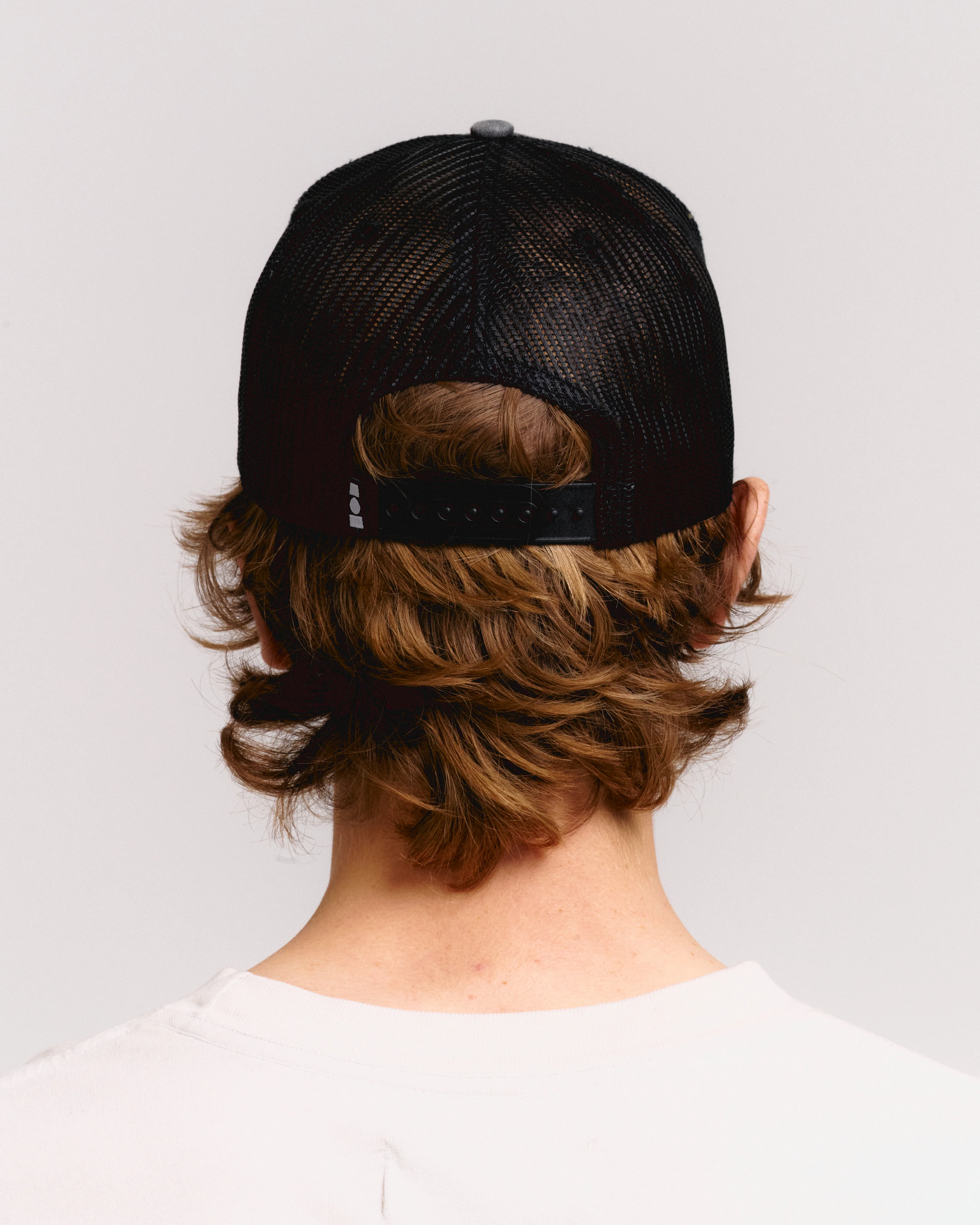 YOUTH ENRICHMENT WASHED TRUCKER HAT - Image 4